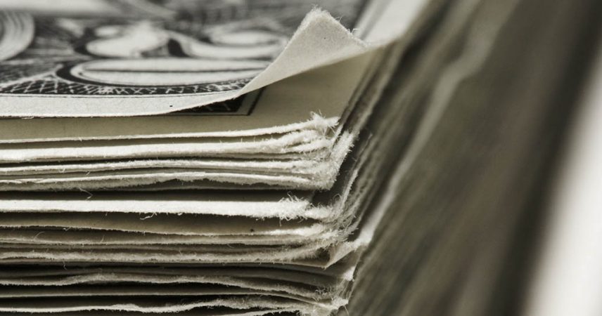 Stack of US Dollar banknotes, close-up - Indiana Connection