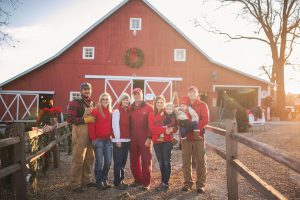 Dull Family in front of a barn