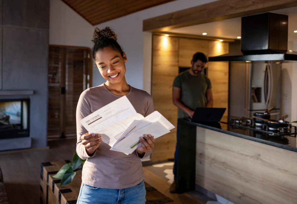 Woman looking at power bill 