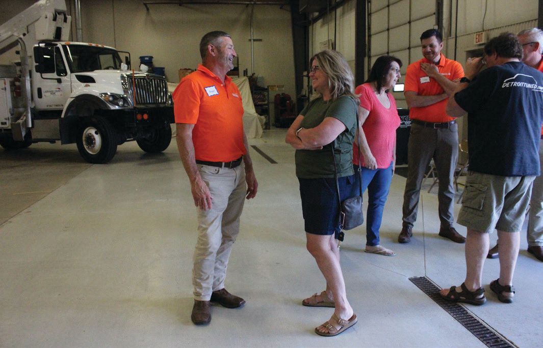 LaGrange County REMC Board President Roger Domer shares a laugh with director Cliff Hibb’s wife, Sandy.