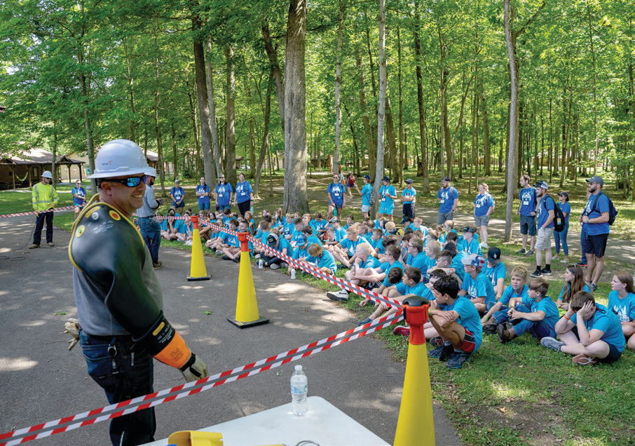 Campers attended a live line demonstration