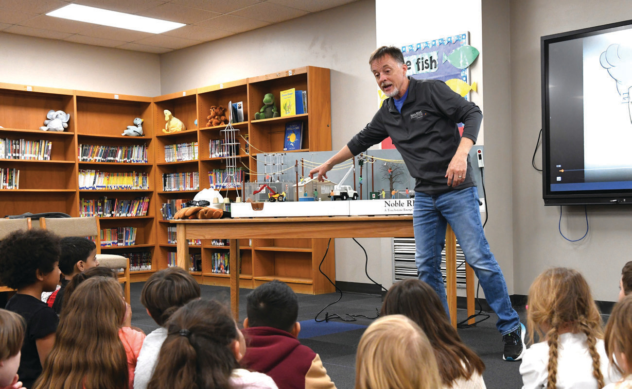 Noble REMC’s Kevin Dreibelbis gives a safety demonstration to local elementary school students.