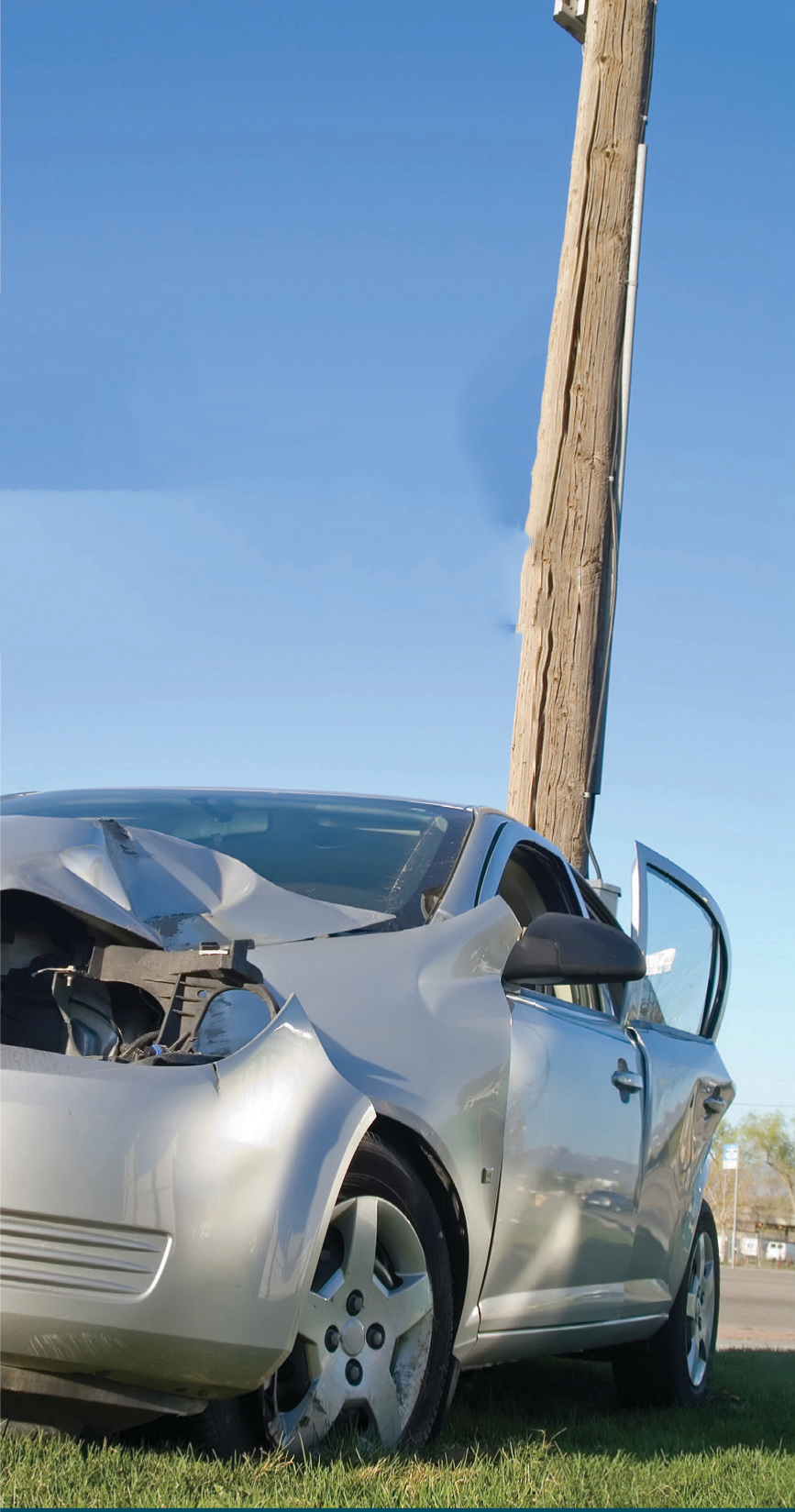 Car hitting a power pole