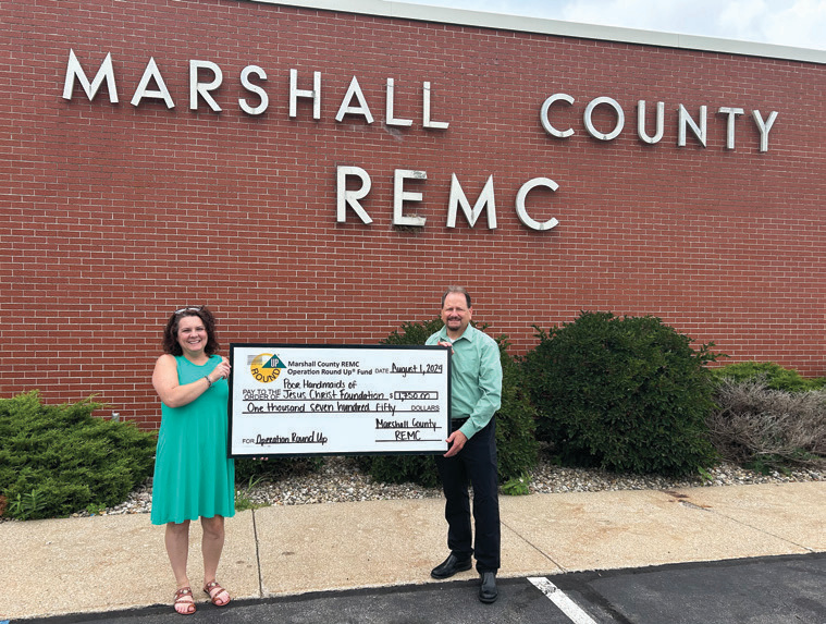 Jessye Gilley (left) and Anthony Englert of the Poor Handmaids of Jesus Christ Foundation.