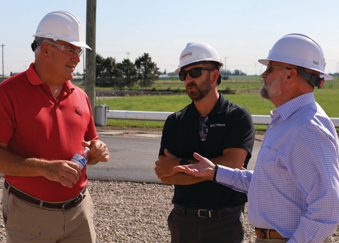 Sen. Andy Zay (IN-R) speaks with Ryan Heater, vice president of government relations for Indiana Electric Cooperatives, and PPEC CEO Randy Price at a recent tour of the Mone Generating Station.