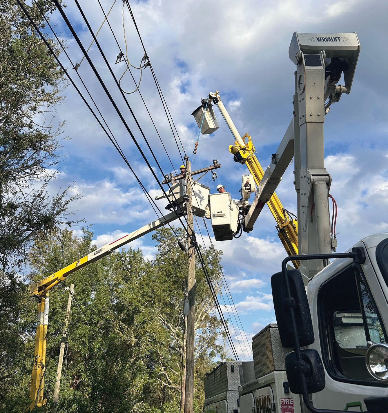 Orange linemen working in Georgia