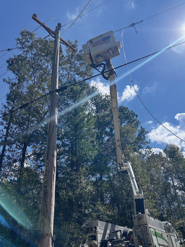 Orange linemen working in Georgia