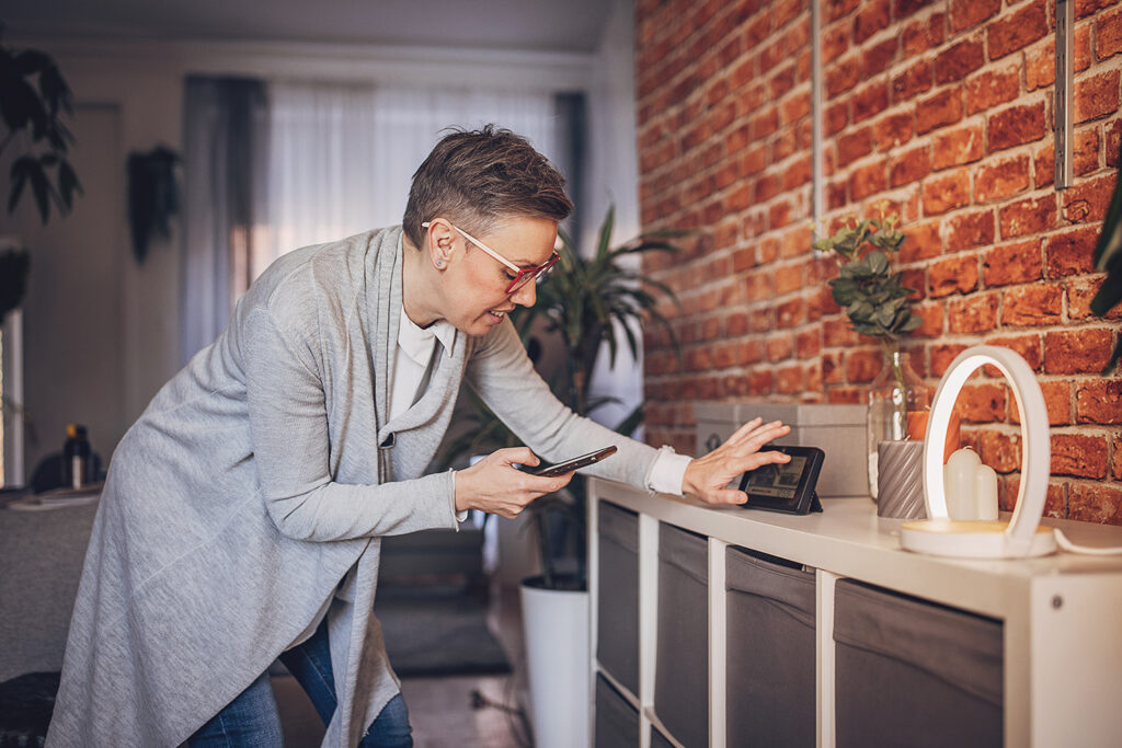 Woman with smart device