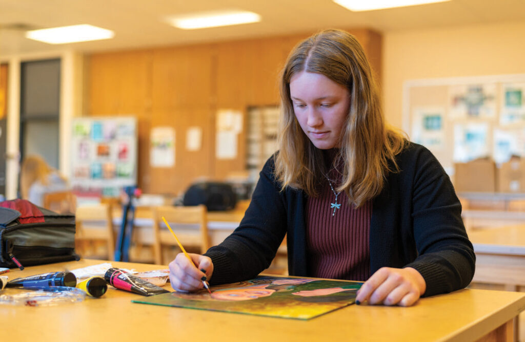 Skinner works on a project during art class at Whitko High School.