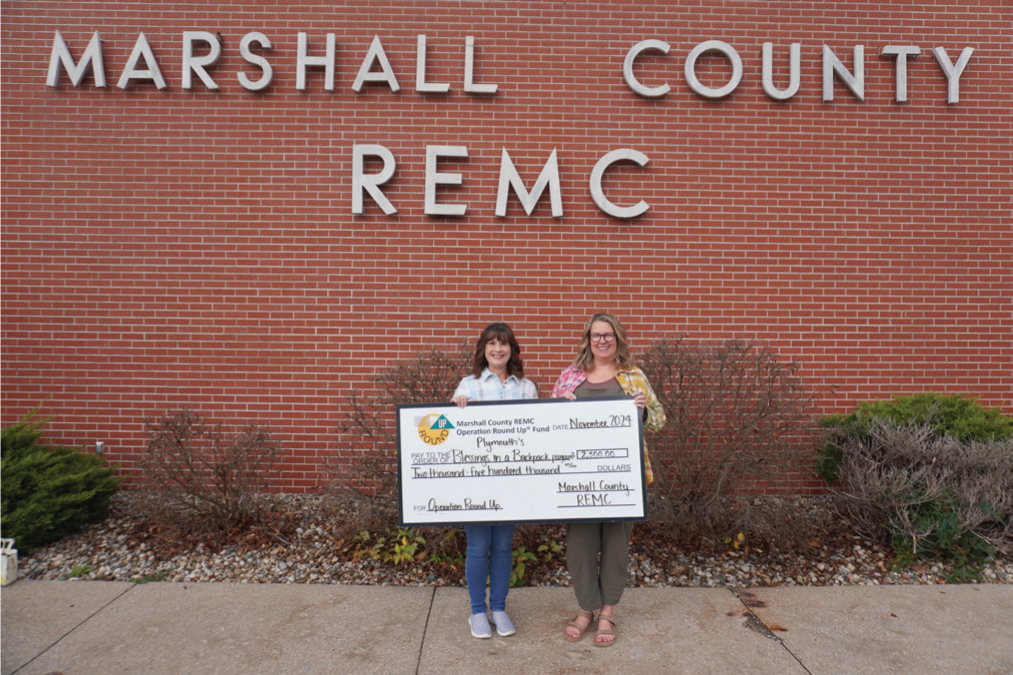 Robin Neidig of Blessings in a Backpack – Plymouth (left) and Chris Garner of the Marshall County Neighborhood Center