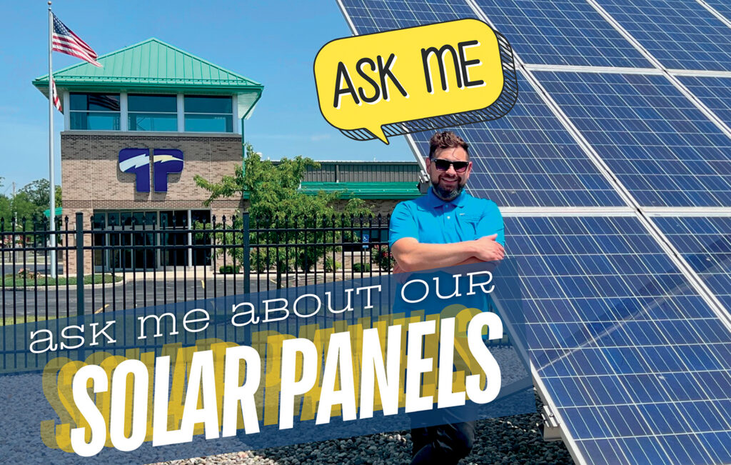 PPEC's Peter Niagu with solar panels